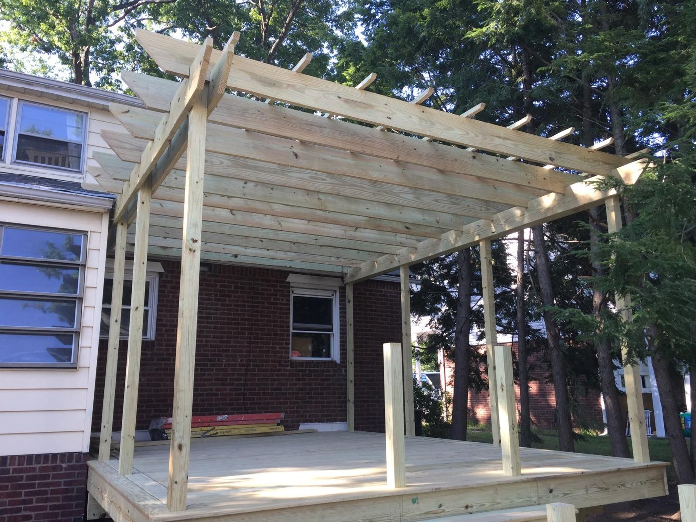 Completed custom cedar pergola over elevated deck Bergen County NJ Bergen Remodeling