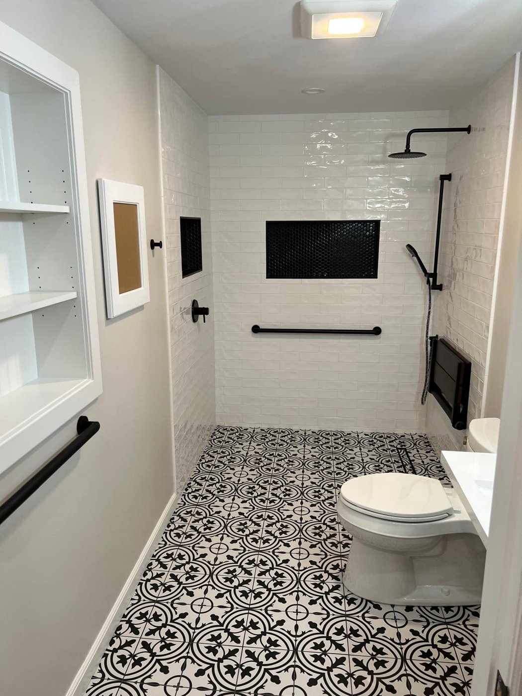 Completed walk-in shower with patterned porcelain floor Bergen County NJ Bergen Remodeling