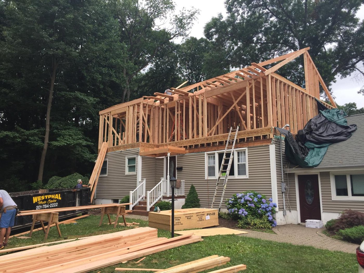 Second story addition framing against clear sky Bergen County NJ Bergen Remodeling