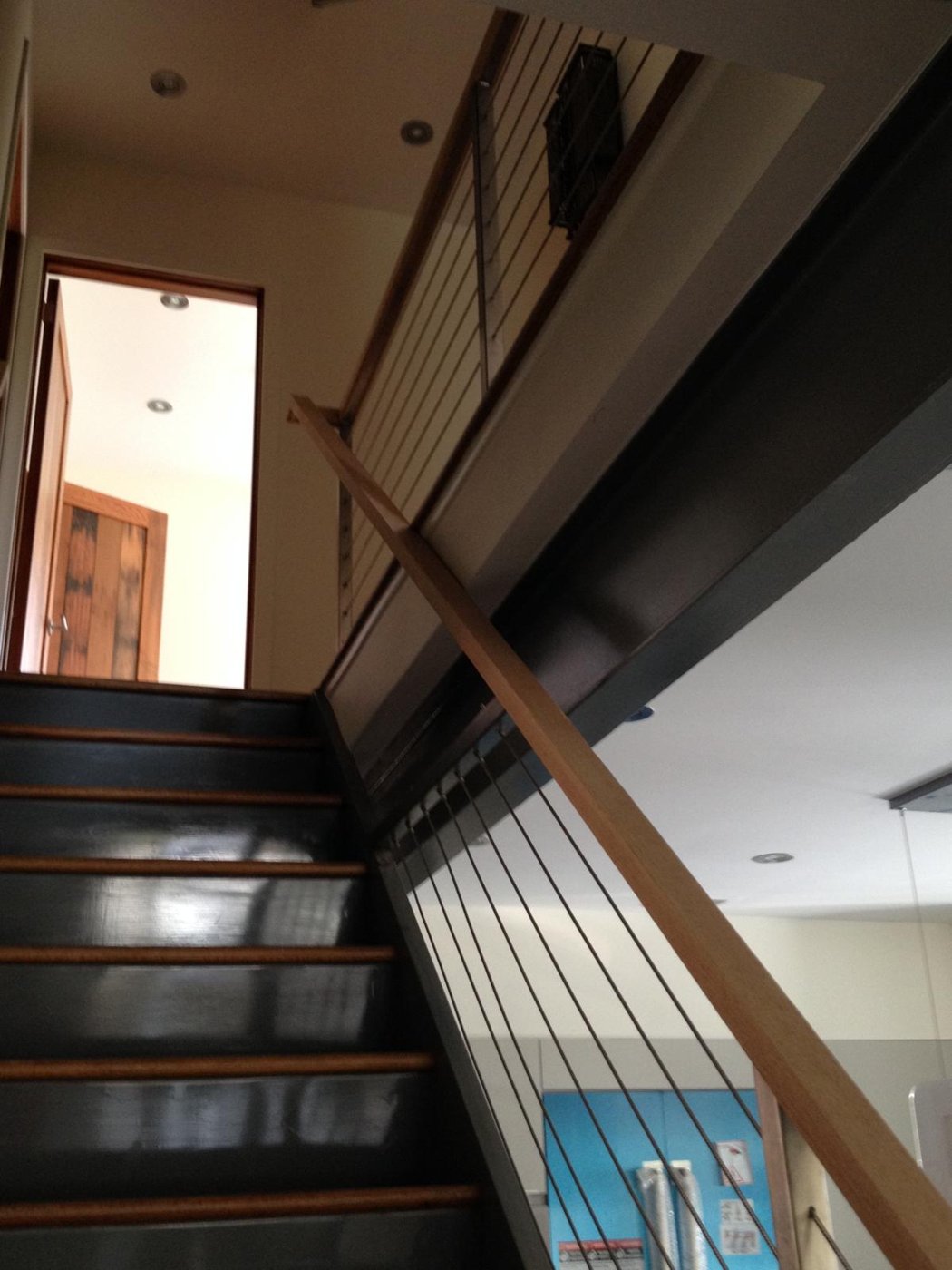 Steel staircase with exposed structural beam Bergen County NJ Bergen Remodeling