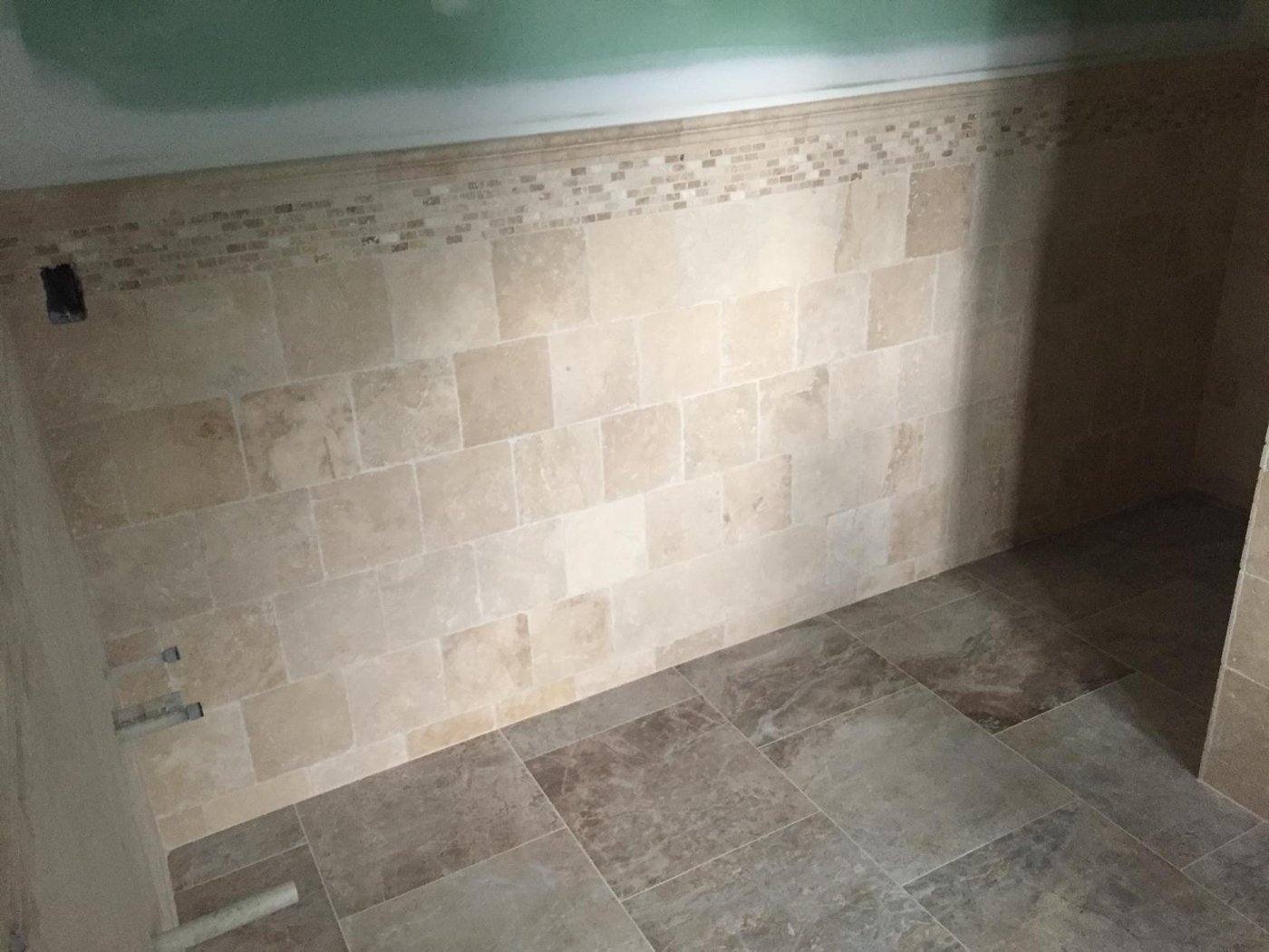 Travertine shower tile installation in progress Bergen County NJ Bergen Remodeling